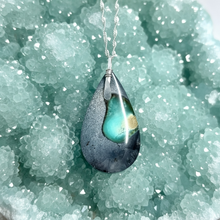 Pendant with opalized wood