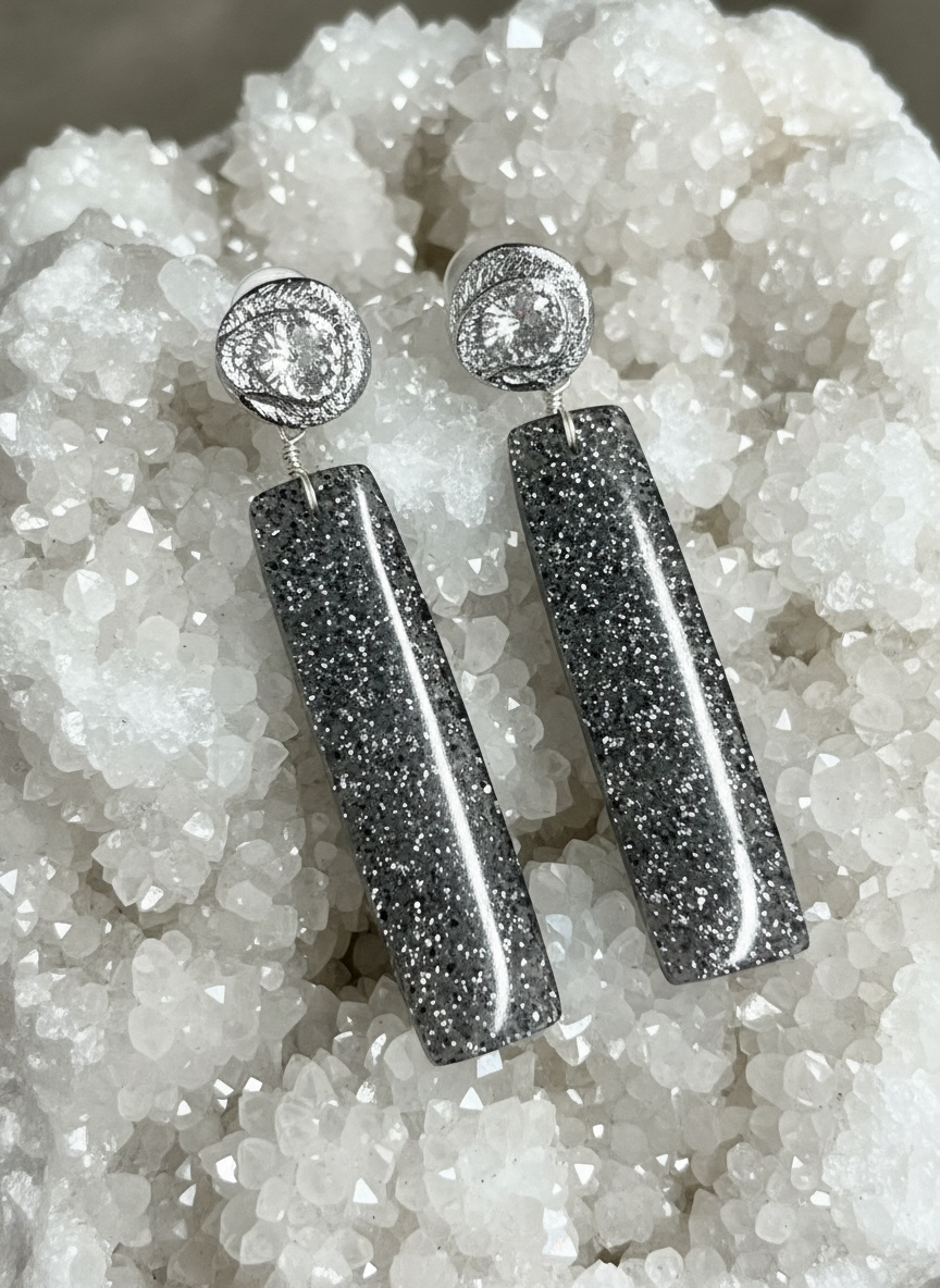 Earrings with natural black sunstone with studs and zircon