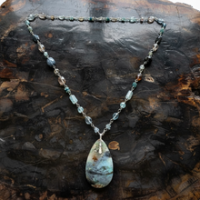Necklace with opalized wood and various stones