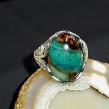 Ring with opalized petrified wood cabochon