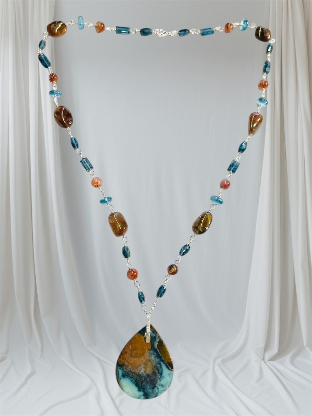 Necklace with blue brown Opalized wood