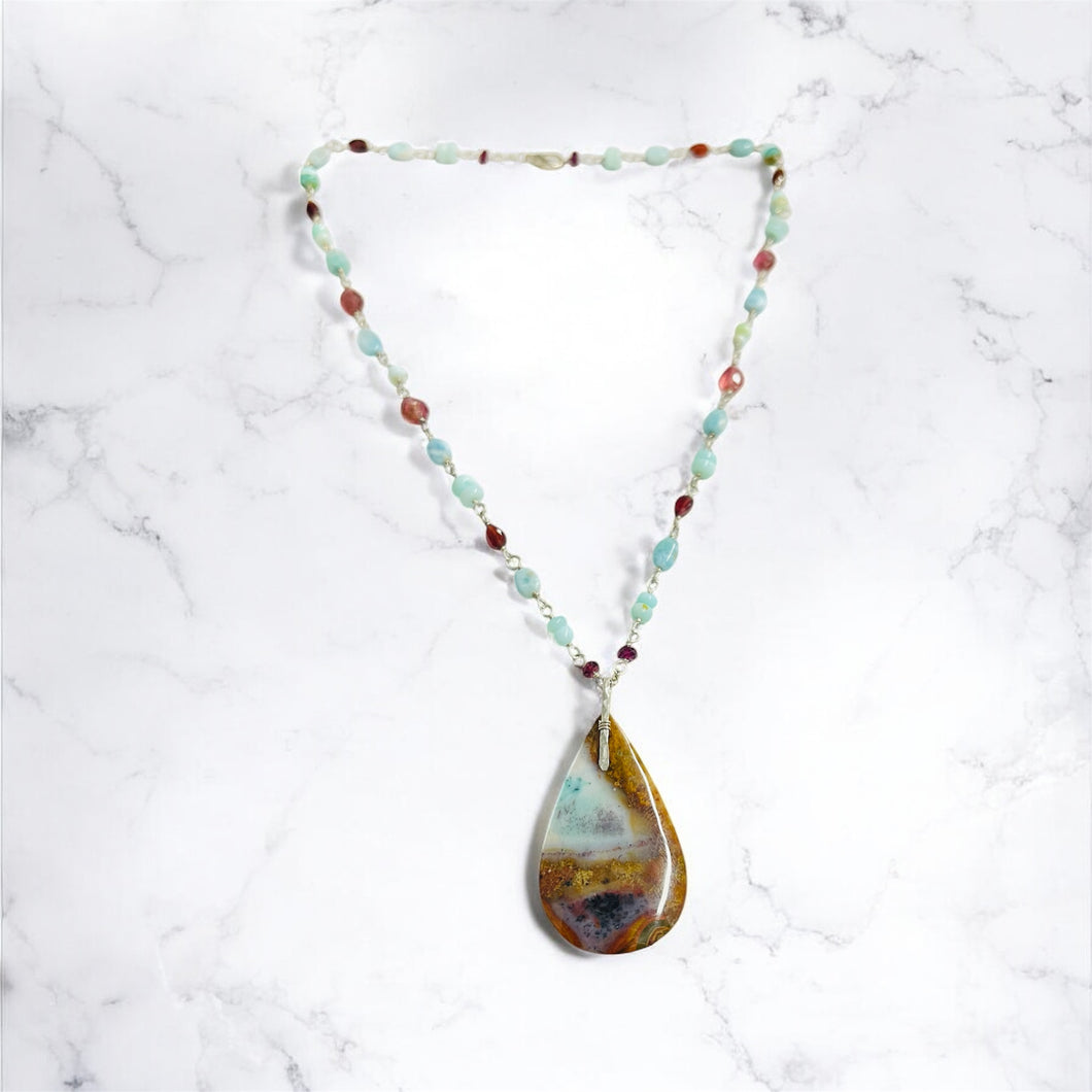 Necklace with deep blue and burgundy colors opalized wood