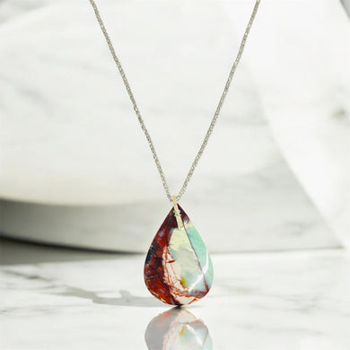 Pendant with natural petrified opalized wood