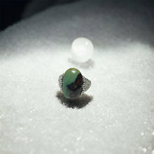 Ring with opalized petrified wood cabochon