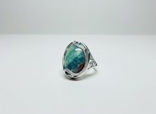 Ring with petrified opalized wood