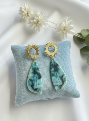 Earrings with light blue opalized wood