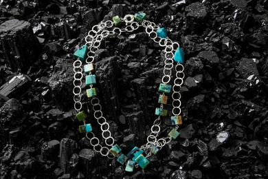 Necklace with chain and opalized wood