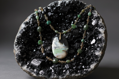 Necklace with opal wood and various stones