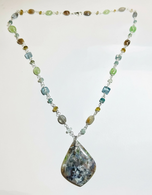 Necklace with copper on opalized wood and various stones