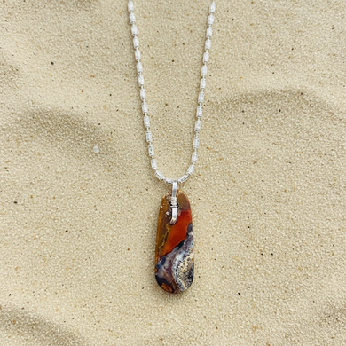 Pendant  with brown color of opalized wood