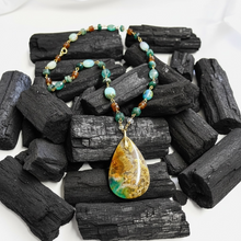 Necklace with deep green and brown colors opalized wood