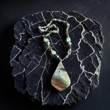 Necklace with opalized wood and various stones