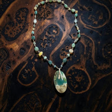 Necklace with opalized wood and various stones