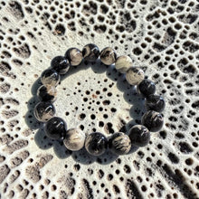 Bracelet with petrified palm root