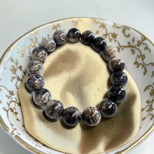 Bracelet with petrified palm root