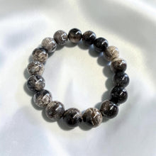 Bracelet with petrified palm root