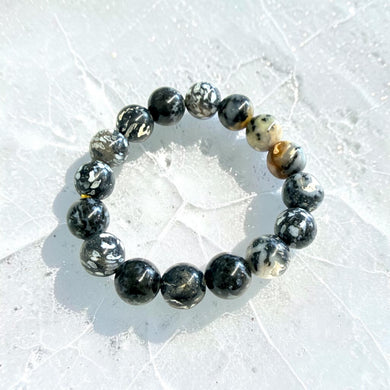 Bracelet with petrified palm root