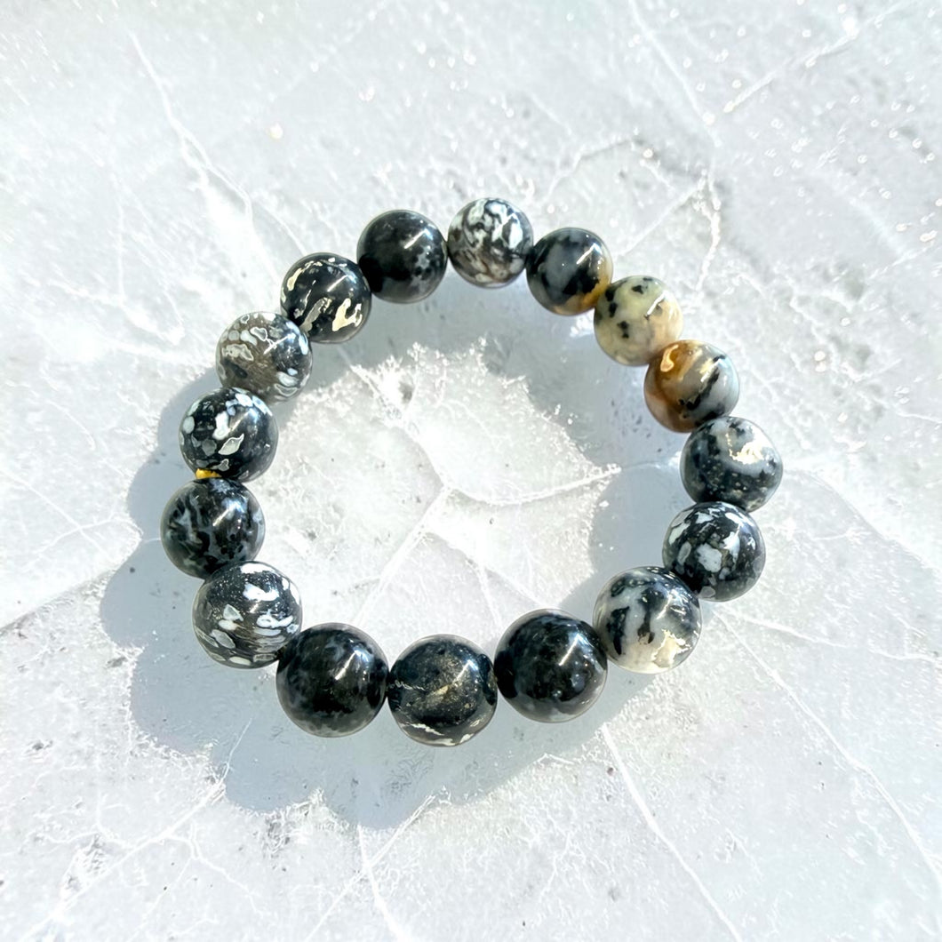 Bracelet with petrified palm root