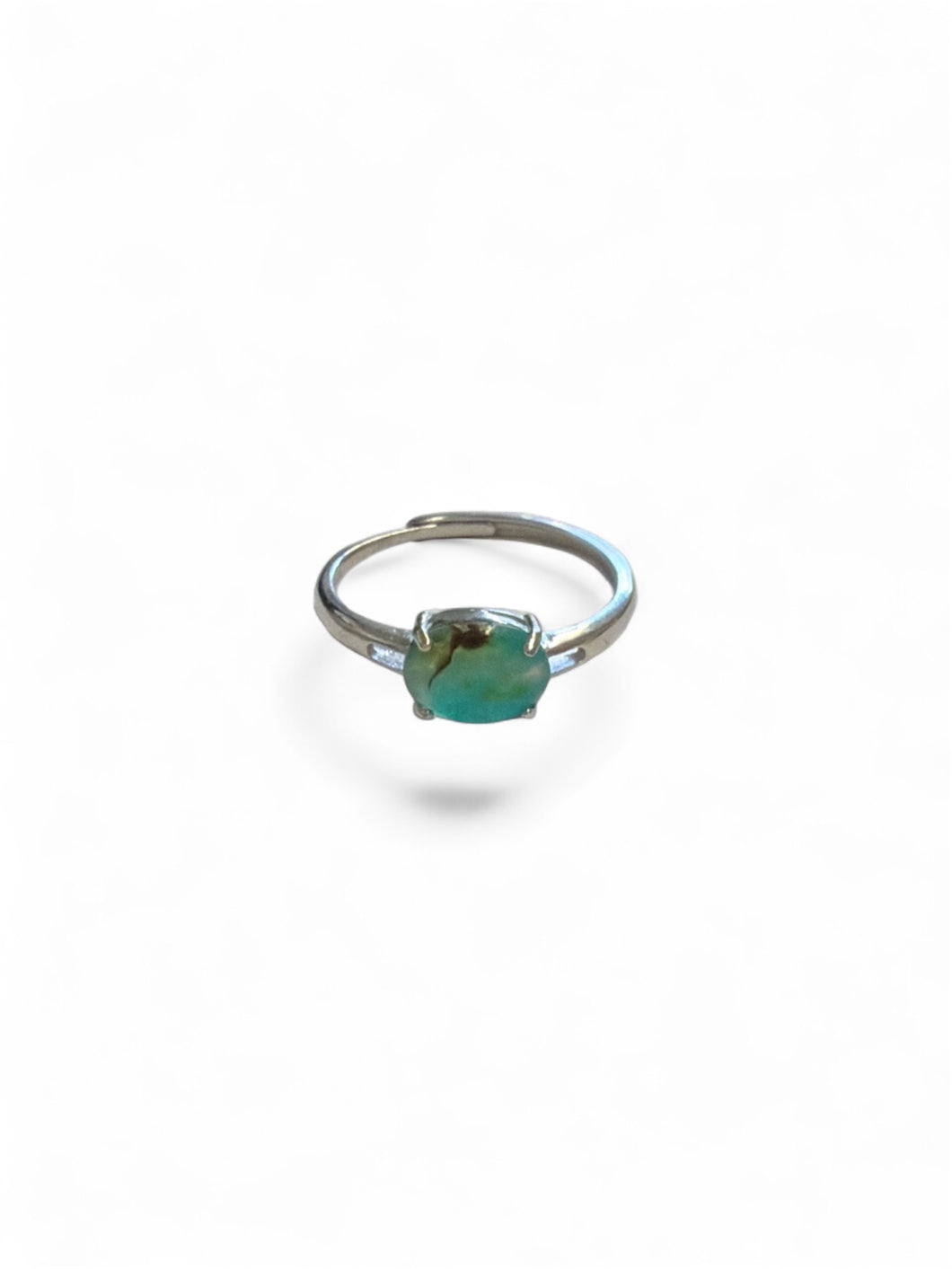 Ring with white Peruvian opal