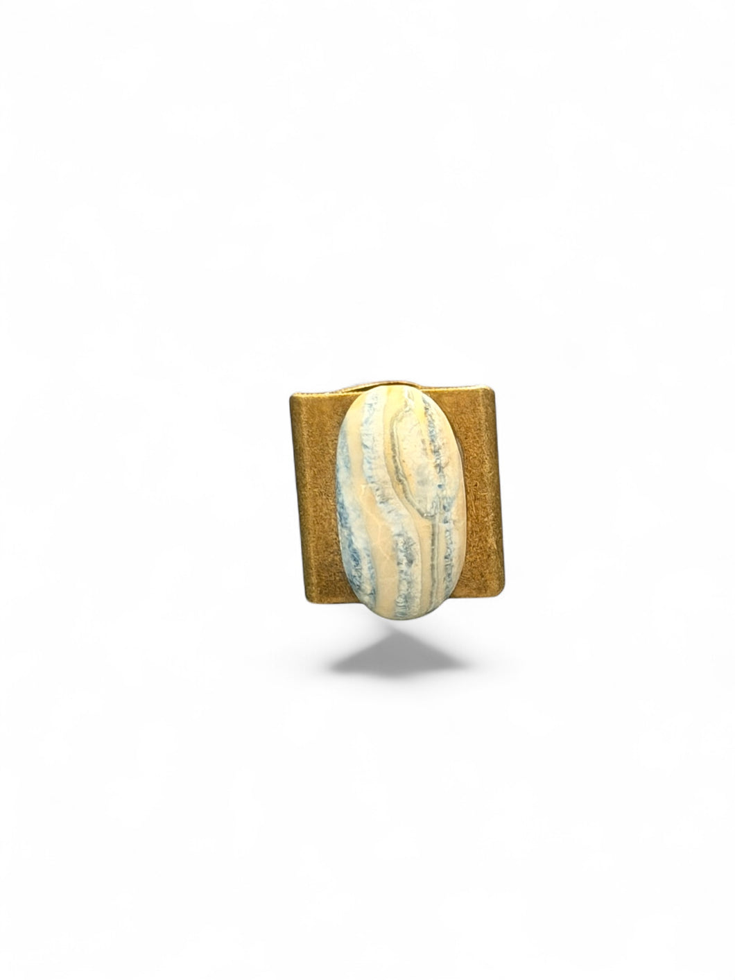 Ring with scheelite cabochon
