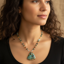 Necklace with opalized wood and various stones