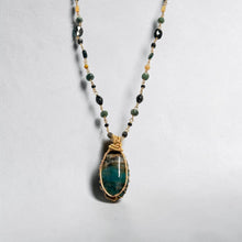 Necklace with dark colors petrified opalized wood and various stones