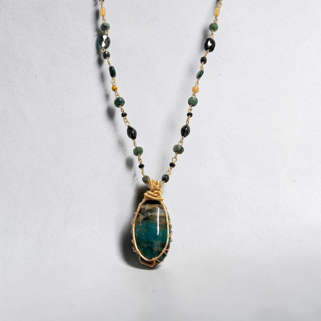 Necklace with dark colors petrified opalized wood and various stones