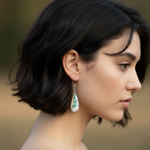 Earrings with chrysocolla on quartz