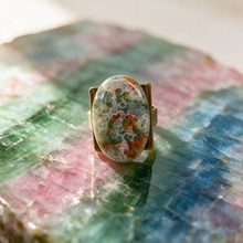 Ring with oval petrified opalized wood cabochon