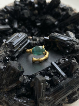 Ring with blue opalized wood with prongs