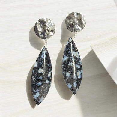 Earrings with long black grey white petrified beads