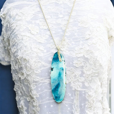 Pendant with blue opalized wood