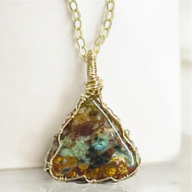 Pendant with agatized opalized wood and natural copper