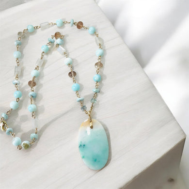Necklace with blue petrified opalized wood