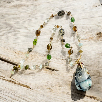 Necklace with colorful opalized wood and various gem stones