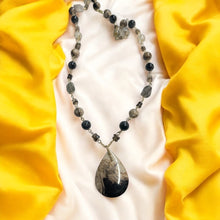 Necklace with petrified palm wood