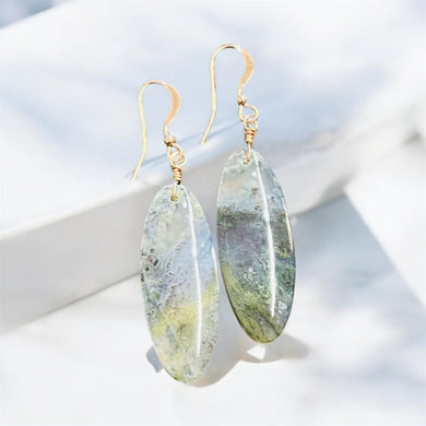 Earrings with translucent moss agate