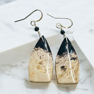 Earrings with petrified palm root