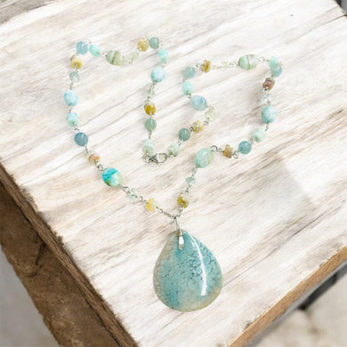 Necklace with blue plume agate and gem stones
