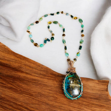 Necklace with crystallized opalized wood and various stones