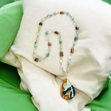 Necklace with opal wood and various stones