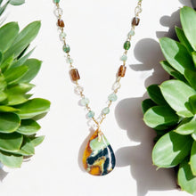 Necklace with opal wood and various stones