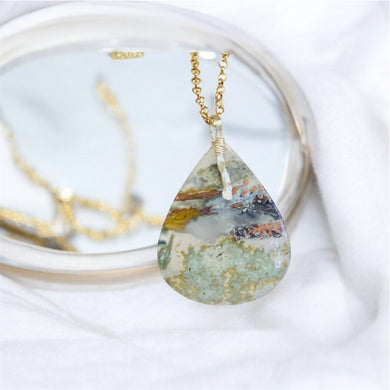 Pendant with moss agate and copper