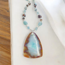 Necklace with petrified opalized wood