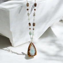 Necklace with petrified opalized wood