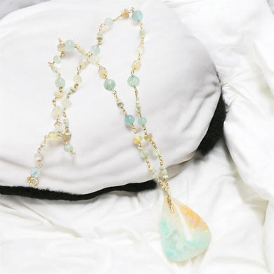 Necklace with light green and white colors opalized wood