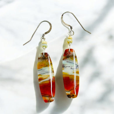 Earrings with red white opalized wood