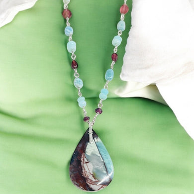 Necklace with deep blue and burgundy colors opalized wood