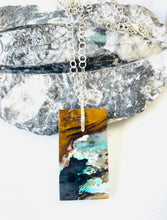Pendant with opalized wood