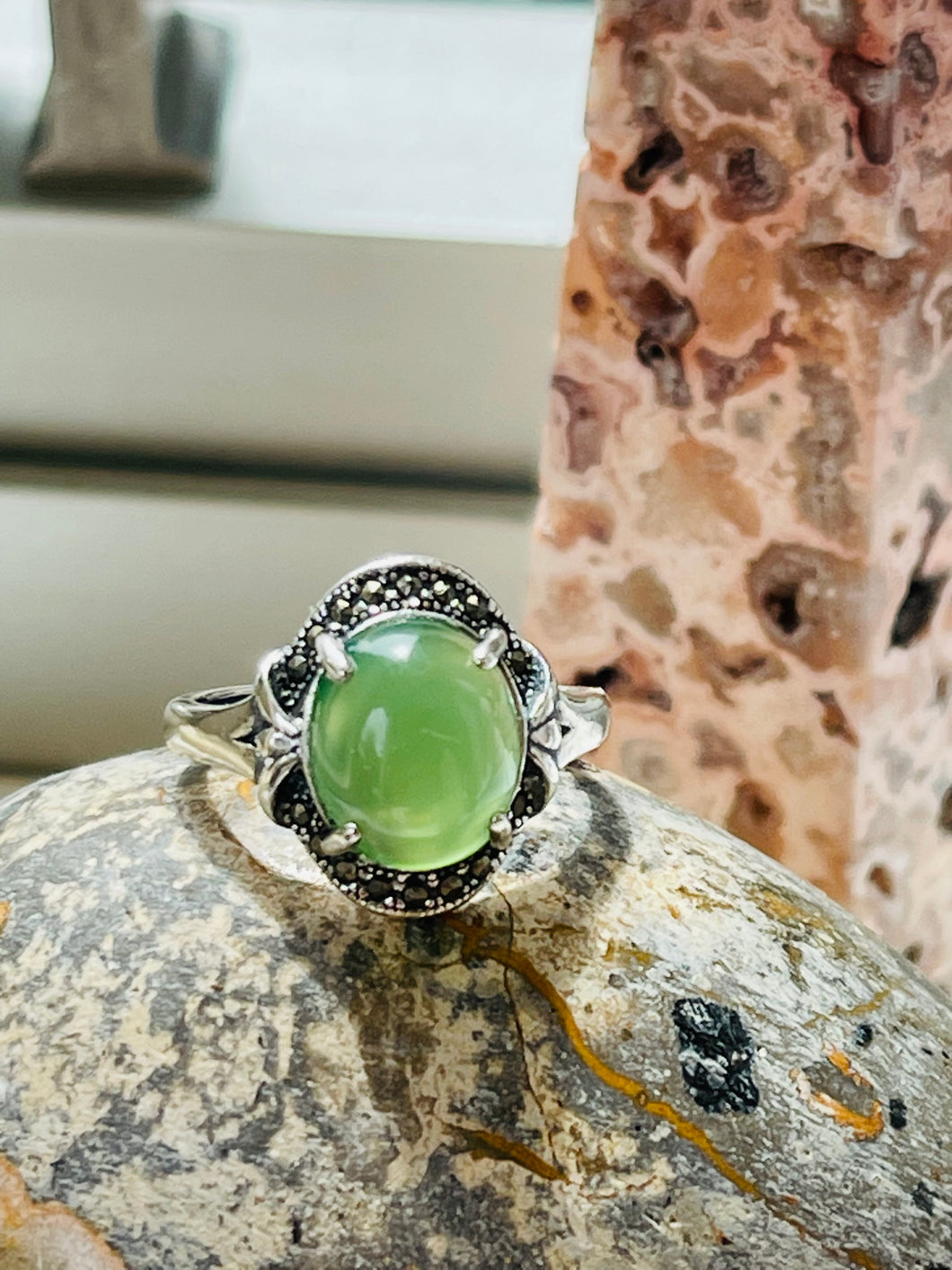 Ring with light green opalized petrified wood cabochon